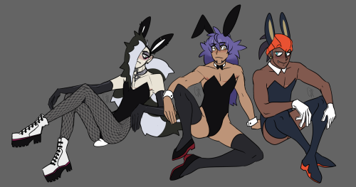 The trio of Piers, Raihan and Leon all wearing bunny suits in various poses sitting down.